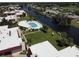 Complex with pool and canal access from above at 78 Boundary Blvd # 193, Rotonda West, FL 33947