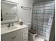 Clean bathroom, shower/tub combo, and updated vanity at 78 Boundary Blvd # 193, Rotonda West, FL 33947