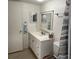 Clean bathroom with updated vanity and shower at 78 Boundary Blvd # 193, Rotonda West, FL 33947