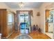 Charming dining area with wood floors and access to a patio at 2132 Abscott St, Port Charlotte, FL 33952