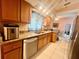 Bright kitchen features granite countertops and modern appliances at 2132 Abscott St, Port Charlotte, FL 33952