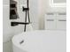 Modern bathtub faucet featuring waterfall design at 5823 Kumquat Ave, North Port, FL 34291
