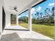 A covered patio offering a tranquil space to enjoy the outdoors at 5823 Kumquat Ave, North Port, FL 34291