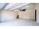Spacious garage with a water heater and plenty of open space at 5823 Kumquat Ave, North Port, FL 34291