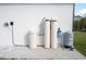 Exterior view of a water filtration and pressure system at 5823 Kumquat Ave, North Port, FL 34291