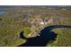 Aerial view of a secluded property nestled along a winding waterway at 32091 Serene Dr, Punta Gorda, FL 33982