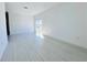 Bright and airy bedroom with sliding glass doors leading to the backyard at 26345 Trinilas Dr, Punta Gorda, FL 33983