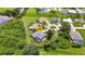 Aerial view of a home near a waterway, with a pool and lush landscaping at 269 Franca St, Punta Gorda, FL 33983