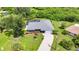 Aerial view of single-story home, paver driveway, and fenced pool at 269 Franca St, Punta Gorda, FL 33983