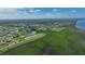 Aerial view of waterfront community with luxury homes and lush landscaping at 17258 Acapulco Rd # 122, Punta Gorda, FL 33955