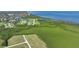 Aerial view showcasing waterfront property with conservation land nearby at 17258 Acapulco Rd # 122, Punta Gorda, FL 33955