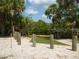 New boat dock with artificial turf and wooden posts at 17258 Acapulco Rd # 122, Punta Gorda, FL 33955