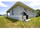 Exterior view of the home's water filtration and AC systems at 2163 Blaser St, Punta Gorda, FL 33980