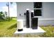 Exterior view of the home's water filtration and AC unit at 2163 Blaser St, Punta Gorda, FL 33980