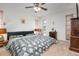 Spacious bedroom with king-size bed and floral bedding at 2484 Broad Ranch Dr, Port Charlotte, FL 33948