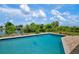 Inviting pool area with canal views at 2484 Broad Ranch Dr, Port Charlotte, FL 33948