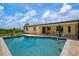 Relaxing pool area with patio furniture at 2484 Broad Ranch Dr, Port Charlotte, FL 33948