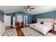 King-size bedroom with wood floors, and walk-in closet at 2736 Suncoast Lakes Blvd, Punta Gorda, FL 33980