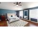 Main bedroom with ensuite bathroom and wood floors at 2736 Suncoast Lakes Blvd, Punta Gorda, FL 33980