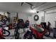 Garage with exercise bike and storage at 2736 Suncoast Lakes Blvd, Punta Gorda, FL 33980