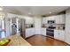 Spacious kitchen with stainless steel appliances and granite countertops at 2736 Suncoast Lakes Blvd, Punta Gorda, FL 33980