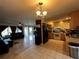 Kitchen with light wood cabinets and granite countertops at 1405 Dorchester St, Port Charlotte, FL 33952