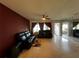 Spacious living room with hardwood floors and large windows at 1405 Dorchester St, Port Charlotte, FL 33952