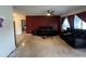 Living Room with dark brown leather couches and burgundy walls at 1405 Dorchester St, Port Charlotte, FL 33952