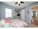 Guest bedroom with white bed frame and coastal decor at 25133 Longmeadow Dr, Punta Gorda, FL 33955