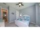 Guest bedroom with white bed frame and coastal decor at 25133 Longmeadow Dr, Punta Gorda, FL 33955