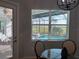 Breakfast nook overlooking pool and golf course views at 25133 Longmeadow Dr, Punta Gorda, FL 33955