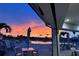 Evening view of community pool with sunset in background at 25133 Longmeadow Dr, Punta Gorda, FL 33955