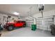 Garage with overhead storage and epoxy floor at 25133 Longmeadow Dr, Punta Gorda, FL 33955