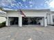 Spacious two-car garage with golf cart and storage at 25133 Longmeadow Dr, Punta Gorda, FL 33955