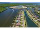 Bird's-eye view of waterfront homes and canals at 15240 Spanish Point Dr, Port Charlotte, FL 33981