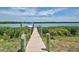 Long wooden walkway to private boat dock at 15240 Spanish Point Dr, Port Charlotte, FL 33981