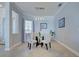 Dining room with modern chandelier and large windows providing lots of light at 15240 Spanish Point Dr, Port Charlotte, FL 33981