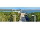 Dock on canal provides easy access to the open water, ideal for boating and fishing at 15240 Spanish Point Dr, Port Charlotte, FL 33981