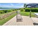 Relaxing deck overlooking waterfront with lounge chair at 15240 Spanish Point Dr, Port Charlotte, FL 33981