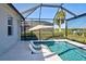 Enjoy the sunny outdoors by the pool, complete with poolside seating and waterfront views at 15240 Spanish Point Dr, Port Charlotte, FL 33981