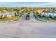 Aerial view of community entrance and roads at 2555 Brassica Dr, North Port, FL 34289