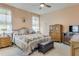 Large bedroom with a king-size bed and ample closet space at 2555 Brassica Dr, North Port, FL 34289