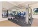 Fitness center with Cybex equipment and mirrors at 2555 Brassica Dr, North Port, FL 34289