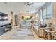 Living room with a view of the kitchen and dining area at 2555 Brassica Dr, North Port, FL 34289