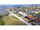 Charming waterfront property featuring a private dock, screened in porch and close proximity to the open water at 56 Colony Point Dr, Punta Gorda, FL 33950