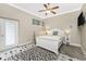 Cozy bedroom with a queen-size bed and access to the outdoors at 1025 Cheshire St, Port Charlotte, FL 33953