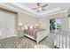 Bright and airy bedroom with direct access to a private patio at 1025 Cheshire St, Port Charlotte, FL 33953