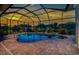 Relaxing screened-in pool area with beautiful sunset views at 1025 Cheshire St, Port Charlotte, FL 33953