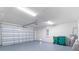 Attached garage with overhead door and ample space at 8136 Welsford Rd, Port Charlotte, FL 33981