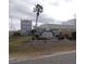 North Port Commons entrance sign and landscaping at 5787 Holiday Park Blvd, North Port, FL 34287